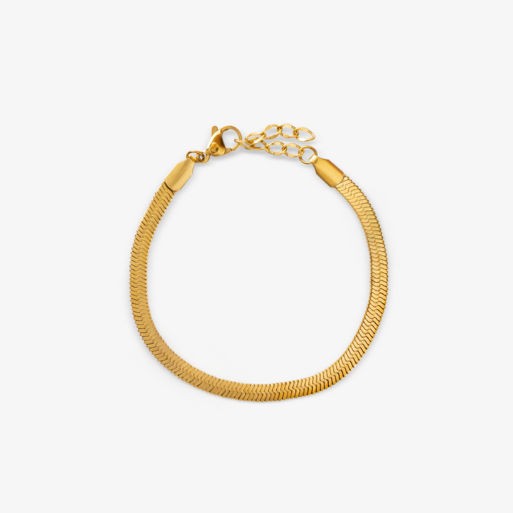 Flad slange armbΓ₯nd i guld